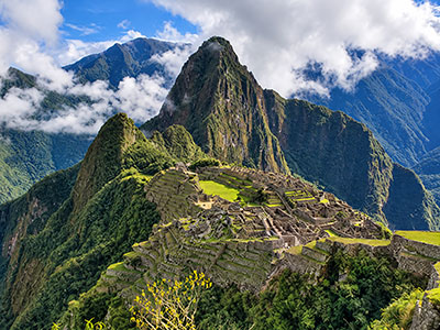 Machu Picchu in Peru surrounded by green Andes mountains