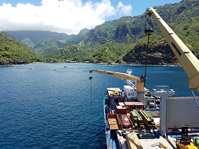 Aranui 5 unloading freight in the Marquesas Islands